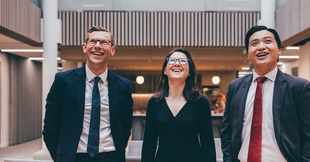 Members of the International team smiling in the Forsters offices