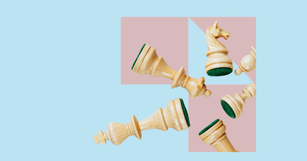 Chess pieces lying down having been knocked over